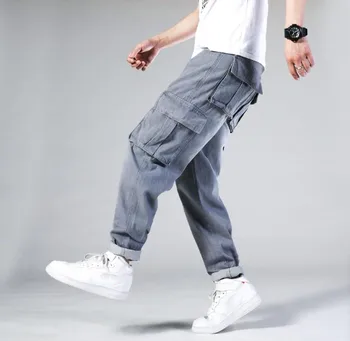 Hip Hop Homens Jeans Baggy Skate Calças Hiphop Solta Meninos dos Homens Multi-bolso Jeans Rap calças dos homens Four Seasons Plus Size 44